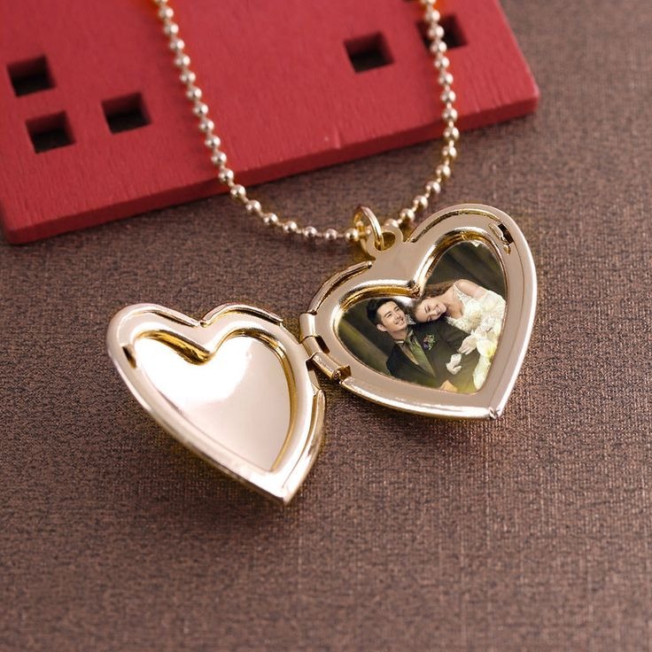 A Heart-Shaped Locket with the Image of the Couple