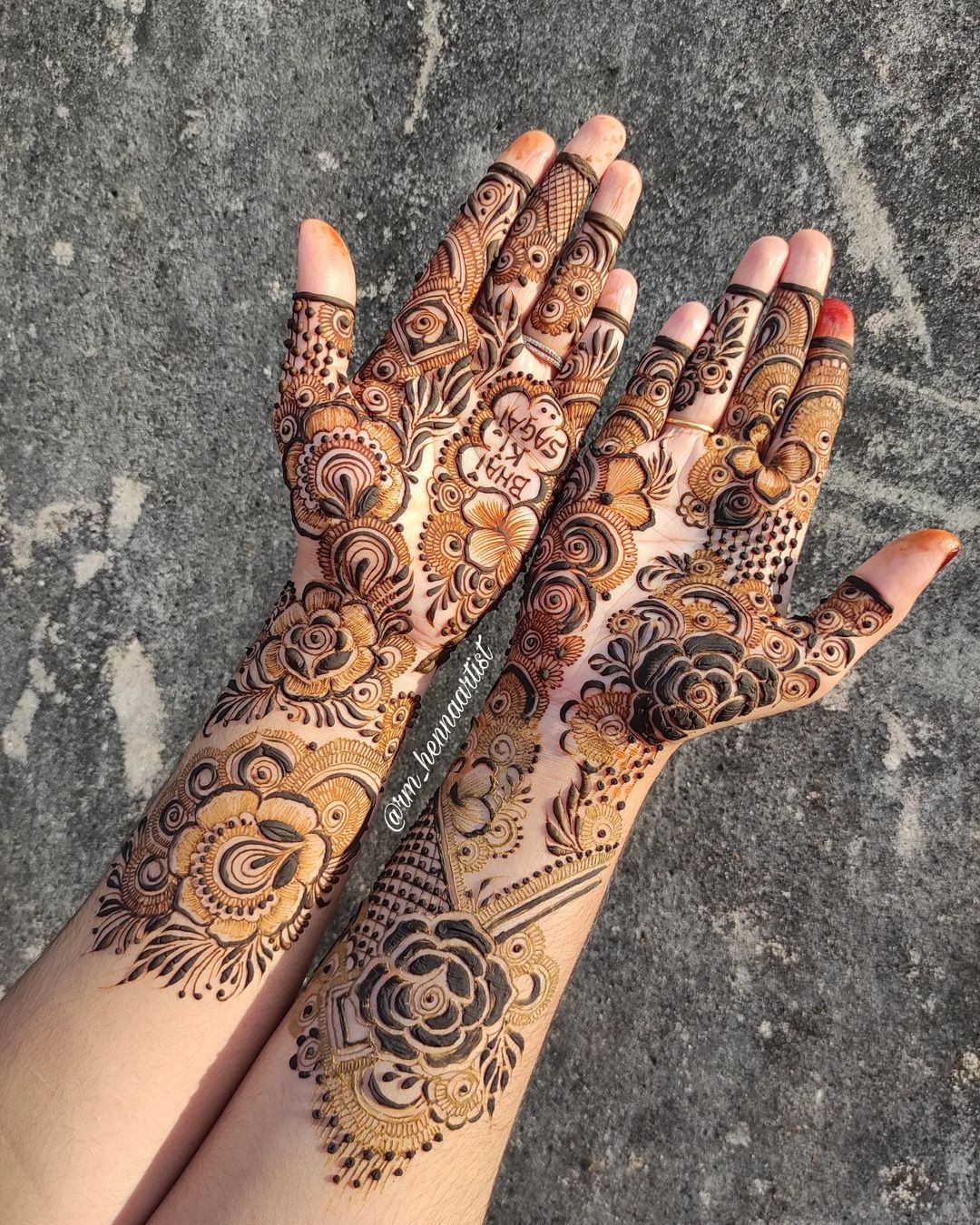 an intricate arabic floral mehendi designs