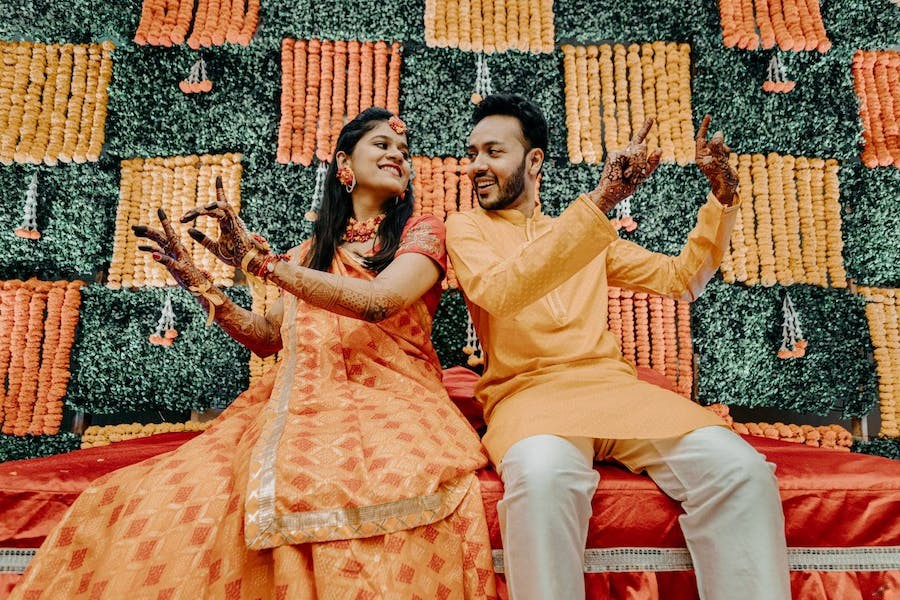 bhangra pose - haldi poses for bride and groom