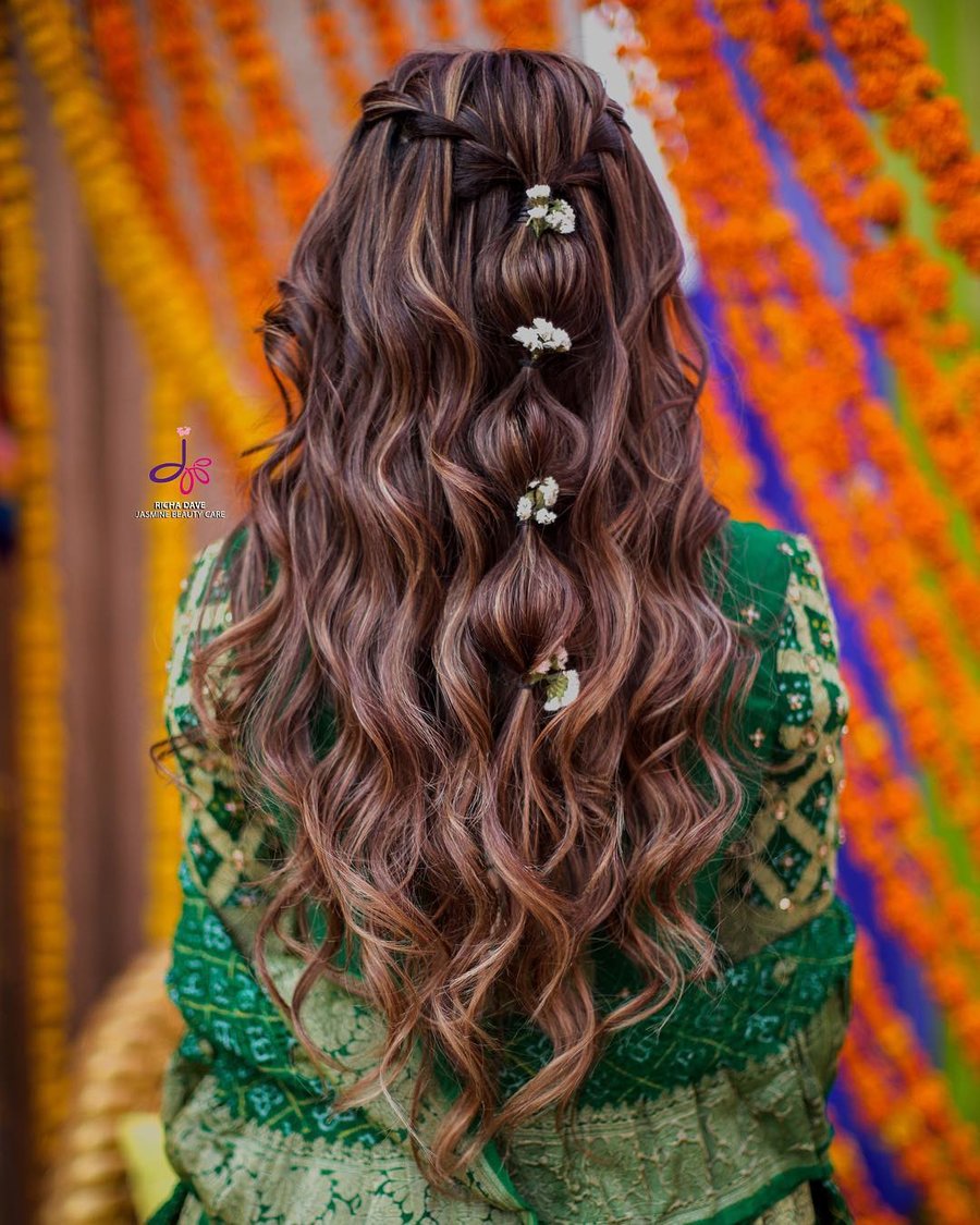 Bubbly Ponytail with Prominent Waves Sangeet Hairstyles for Long Hair