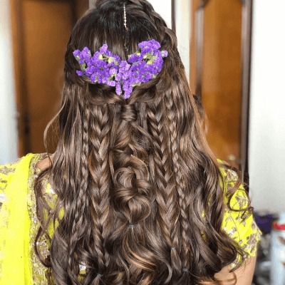 crown puff and edgy braids - lehenga hairstyles