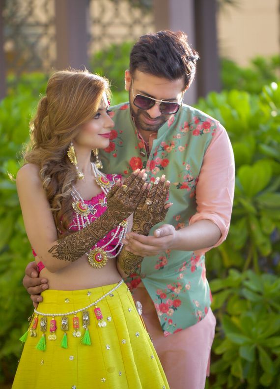 cute bride and groom mehndi poses