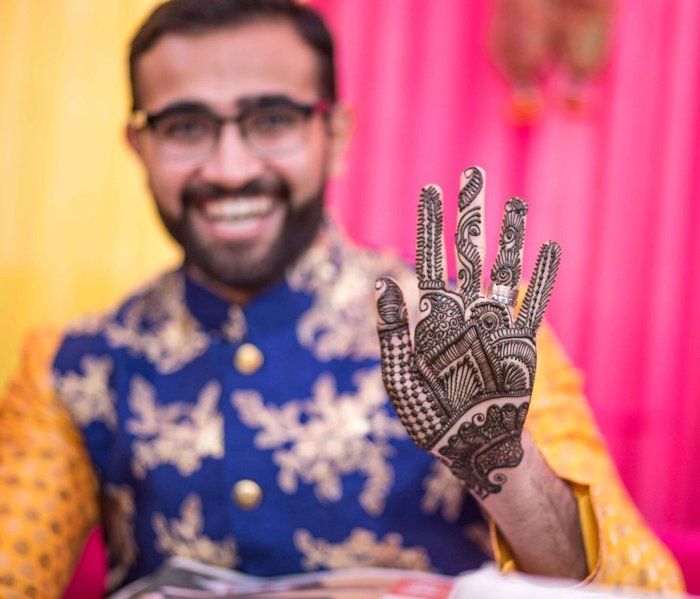 elaborate indian mehndi design for groom