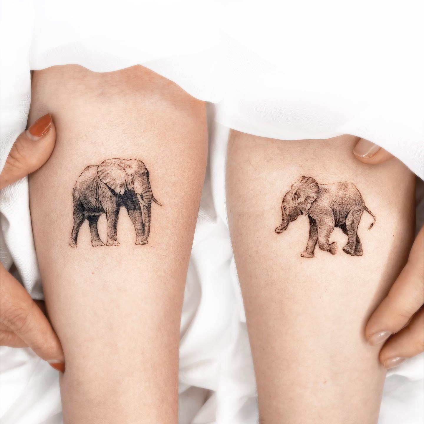 elephant obsessed tattoos for couple