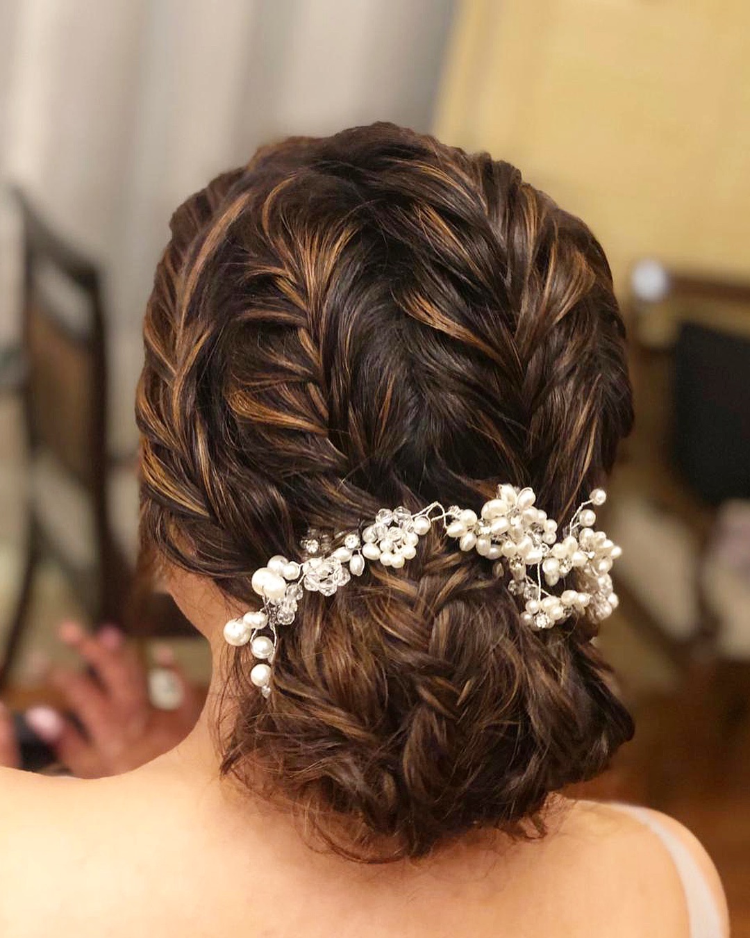 fishtail braid bun - lehenga hairstyles