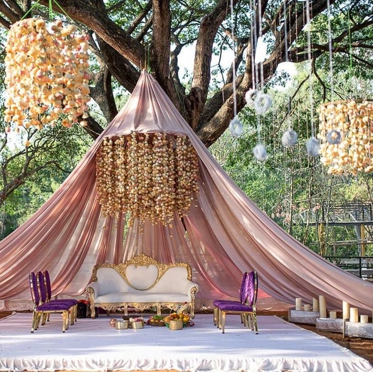 floral chandeliers and tent style wedding mandap decoration