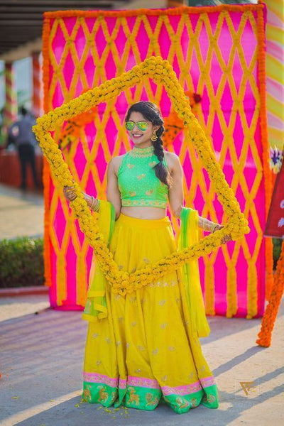 frame in a frame pose for your haldi ceremony poses for bride