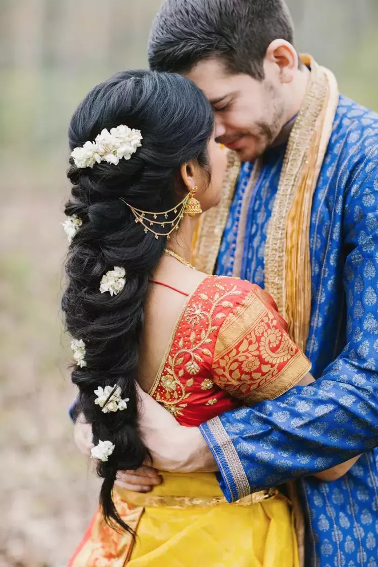 french braid with jasmine - wedding hair trends