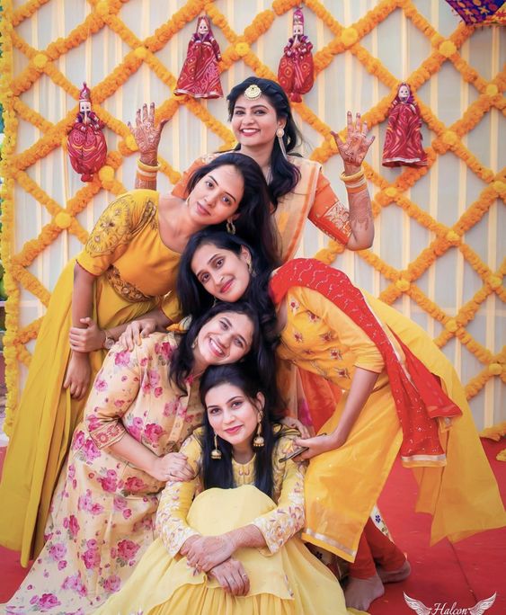 having fun with bridesmaids mehndi poses