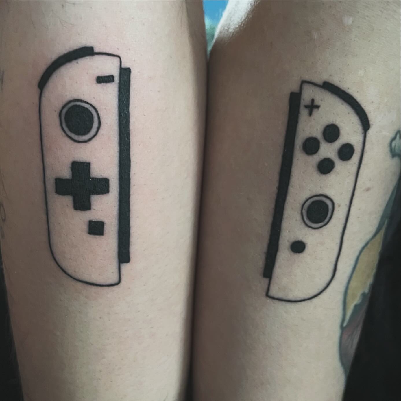 Nintendo Swtich like gaming console tattoo for game lovers couples