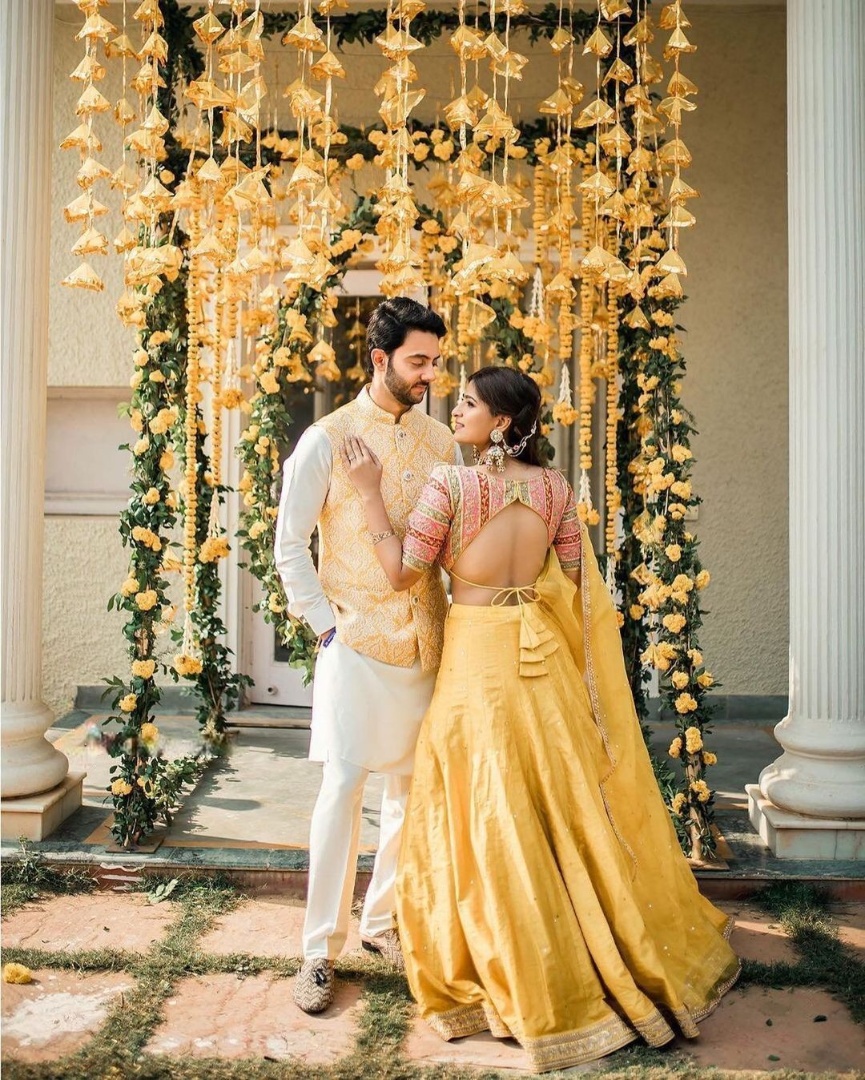 Background Haldi Decoration - golden tassels