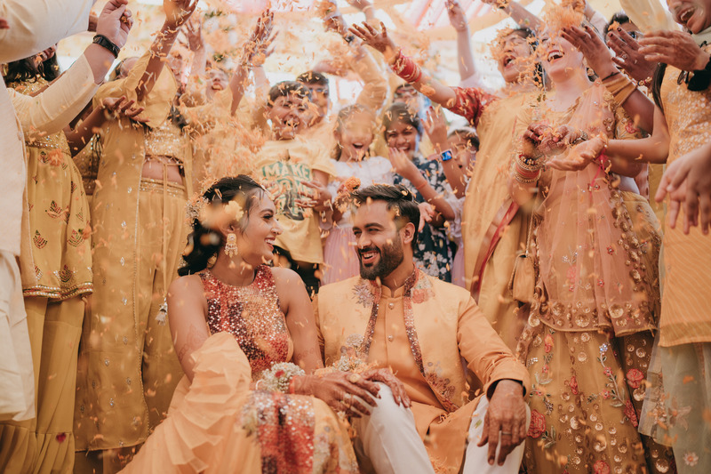 happy couple - haldi poses for bride and groom