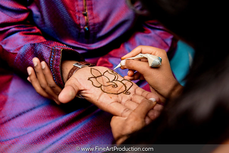 groom in the process mehndi poses