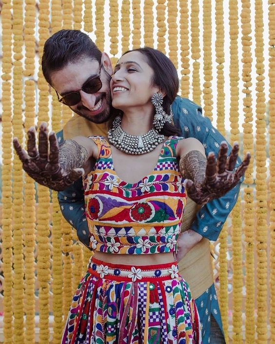 intimate bride and groom mehndi poses