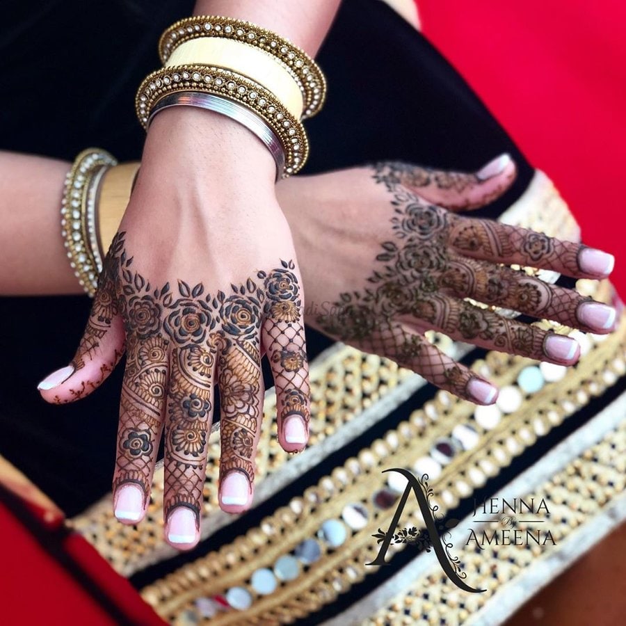 intricate finger design floral mehendi designs