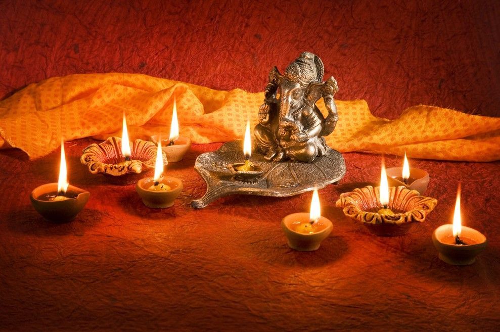 candles and diyas ganpati decoration