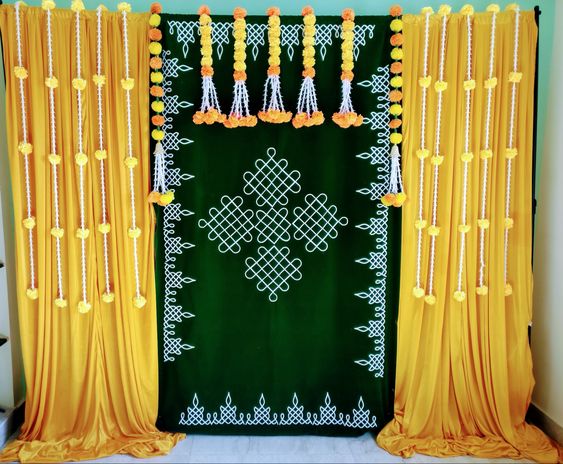 kolam backdrop for indoor haldi decoration