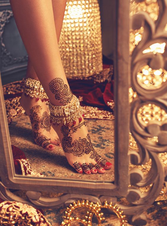 leg mehndi design flaunting for mehndi poses