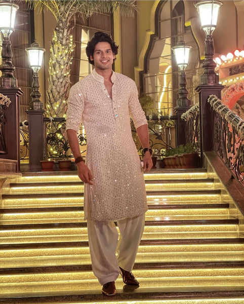 light pink sequin punjabi kurta groom haldi outfits