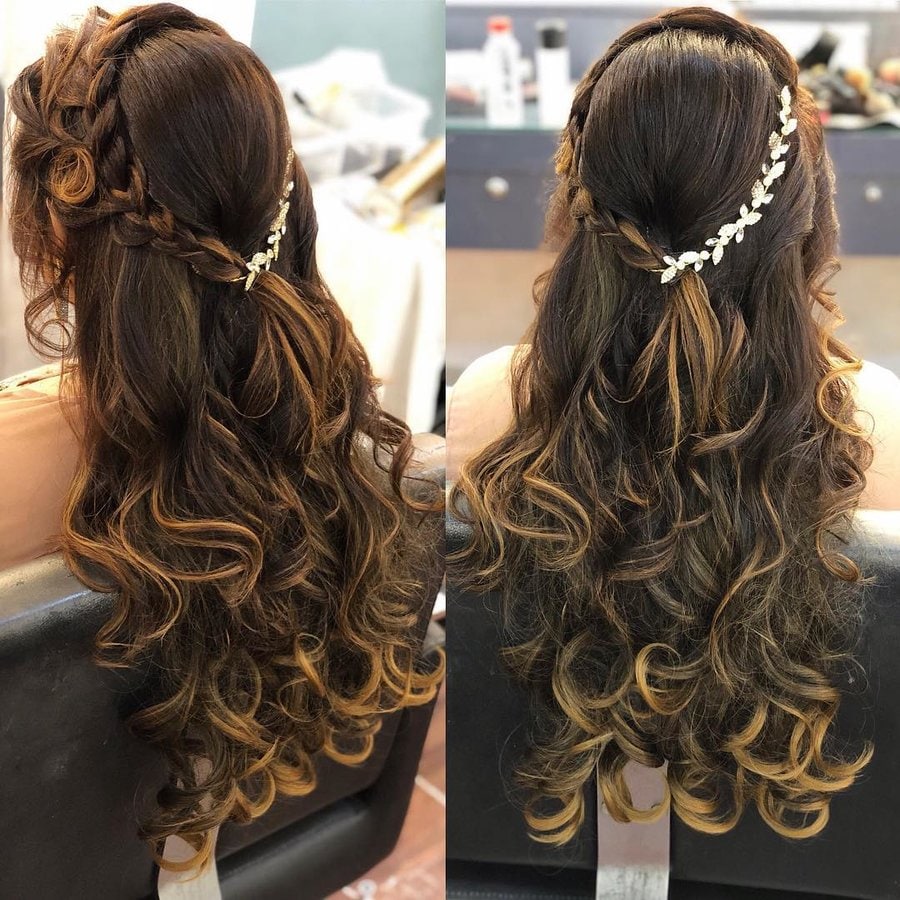 loose crown braid with messy curls for sangeet hairstyles