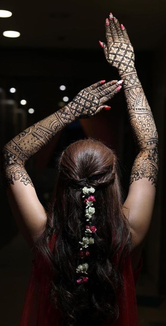 back angle flaunting mehndi design mehndi poses