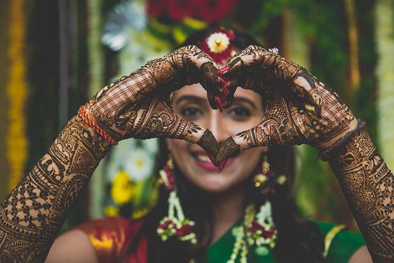 heart gesture with hands for mehndi poses