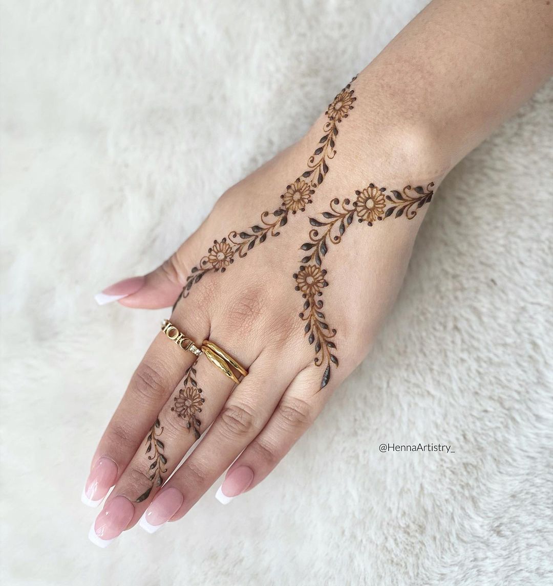 minimal floral mehendi designs with small flowers for back hand