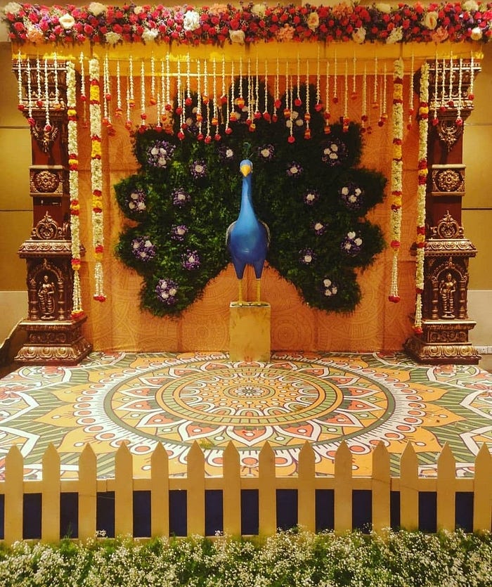 peacock inspired background haldi ceremony decoration