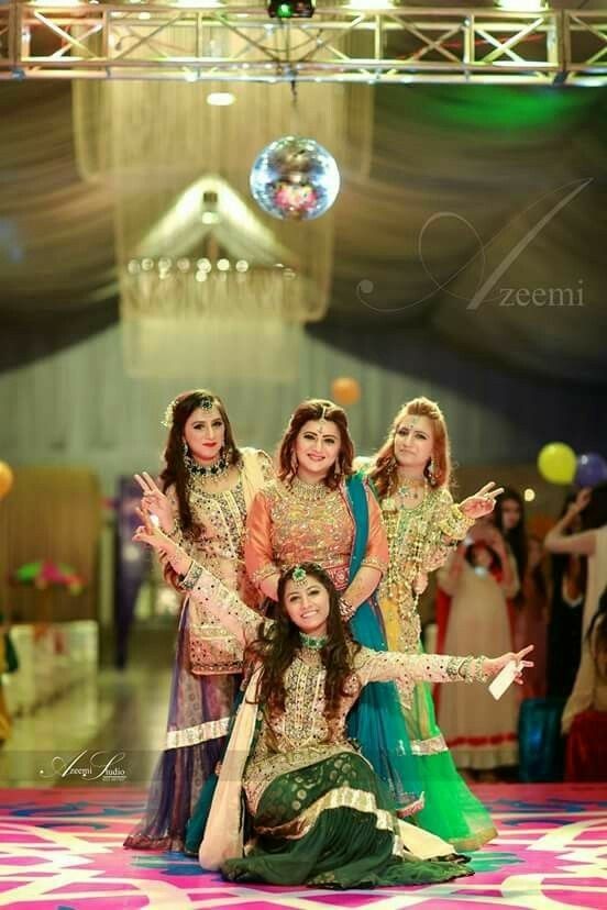 having fun with bridesmaids for mehdni poses