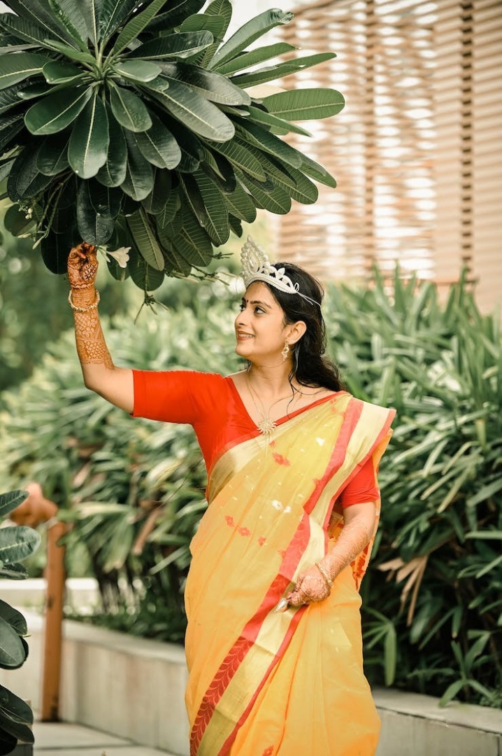 pose with flower - haldi poses for bride