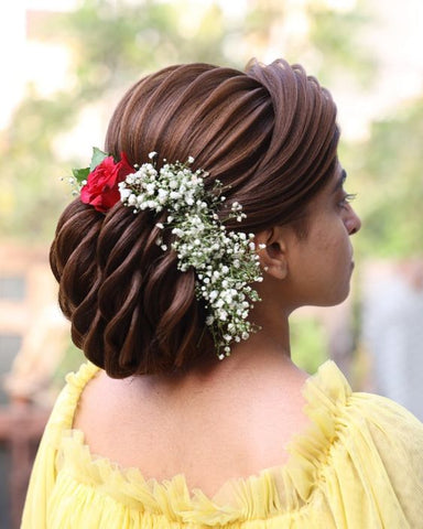 puff bun with vintage curls hairstyles for saree