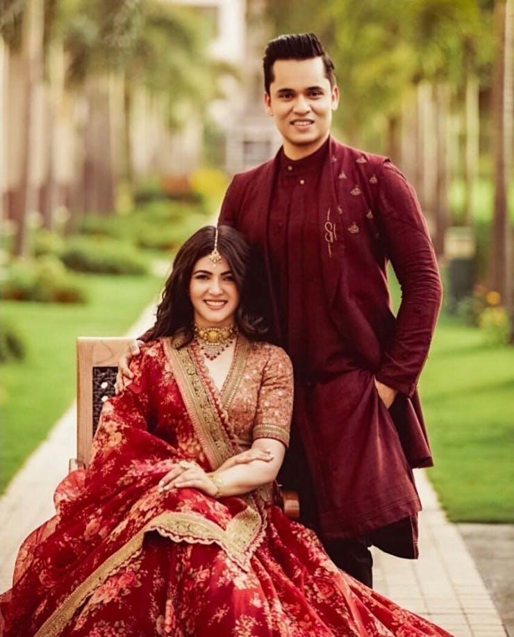 red matching maroon couple dress for engagement