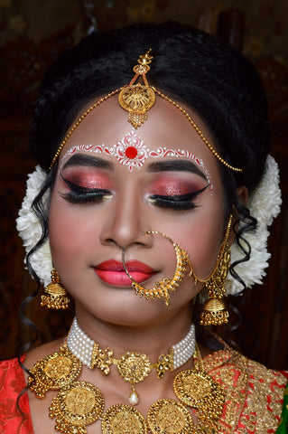 magical and regal red south indian bridal makeup