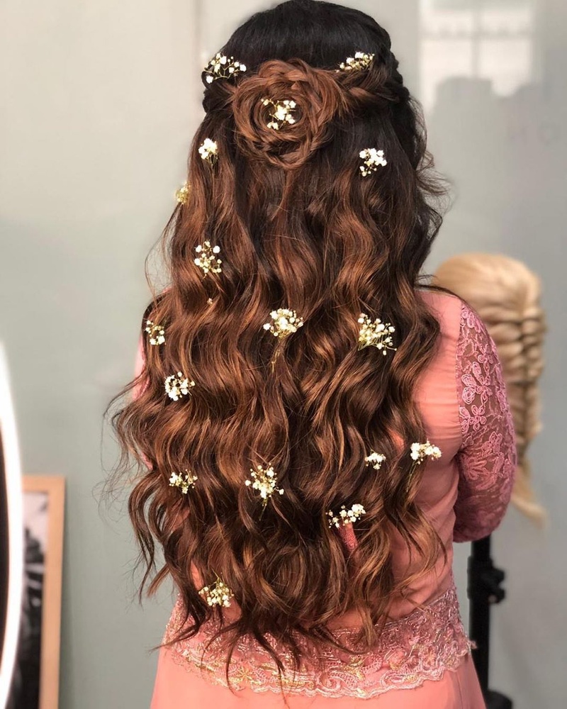 rose bun and beachy waves - lehenga hairstyles