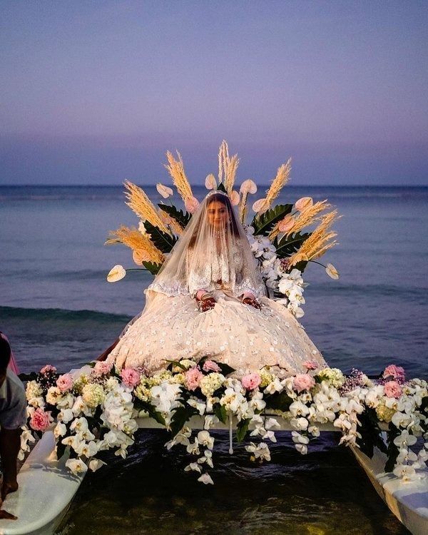 entry in a houseboat or shikara - bridal entry