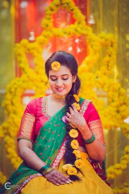 side braid hairstyle adorned with yellow flowers