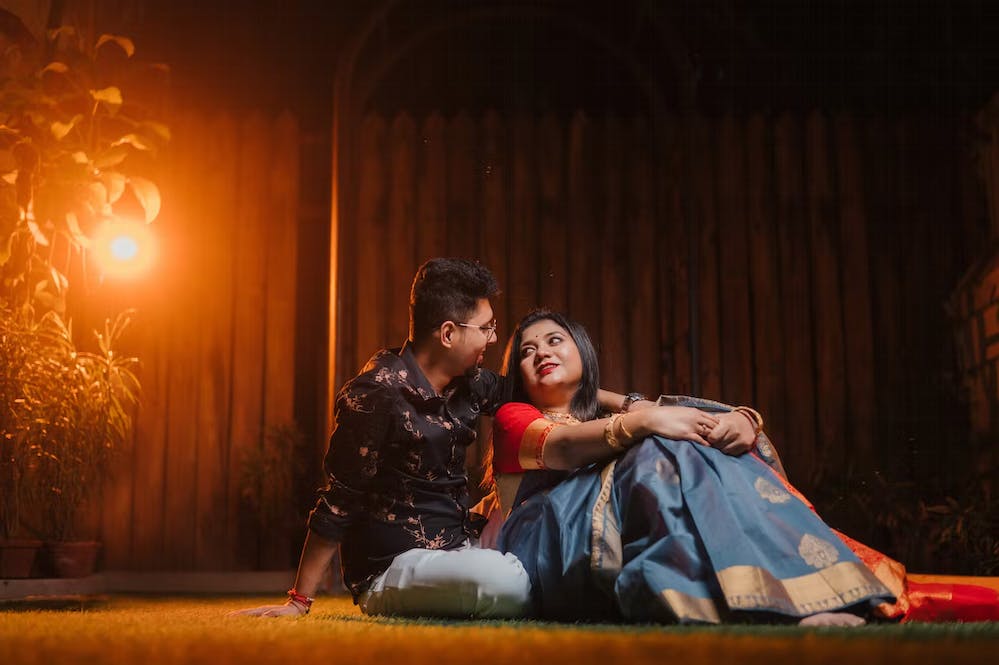 sitting and eyes locked pose - wedding photoshoot