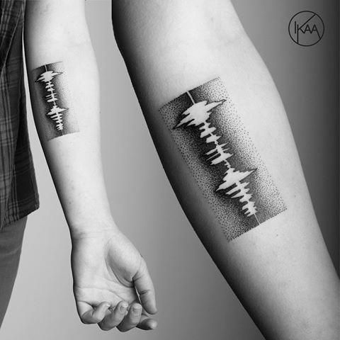 Soundwave tattoos for couple