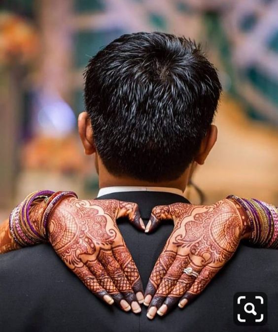 stylish bride and groom mehndi poses