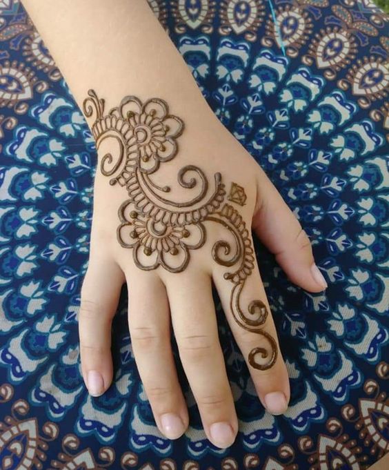 tattoo style mehendi design for back hands for kids