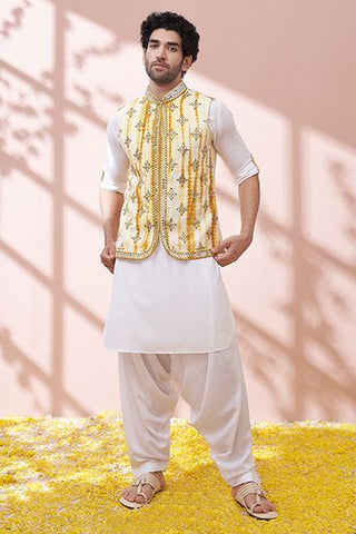 tie-dye bandi jacket and white kurta for grooms for haldi