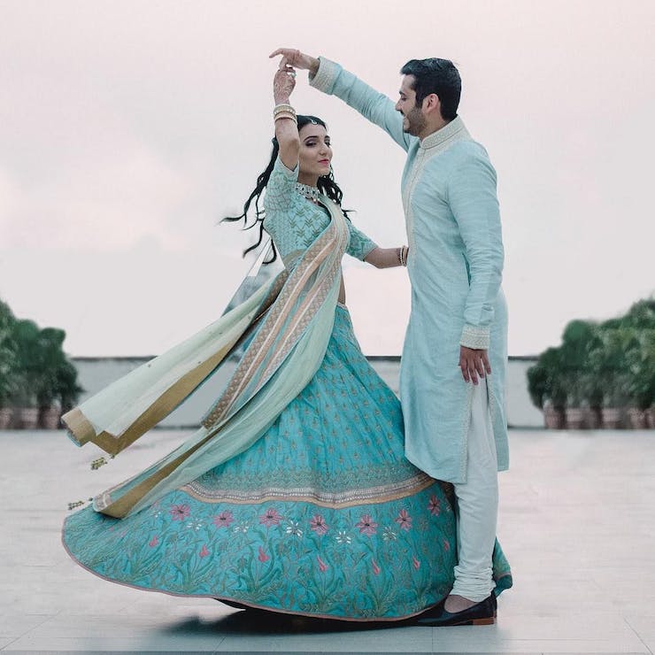 turquoise outfits - Engagement Dress for Indian Couple