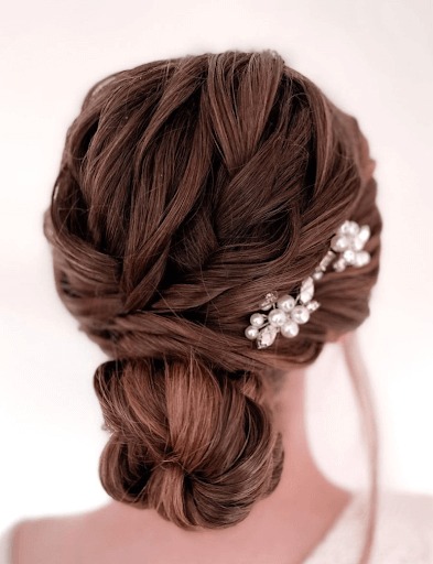 twisted braided bun with shiny embellishment