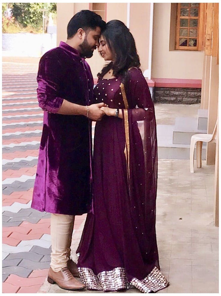 purple velvet coordinated outfits for the couple for engagement