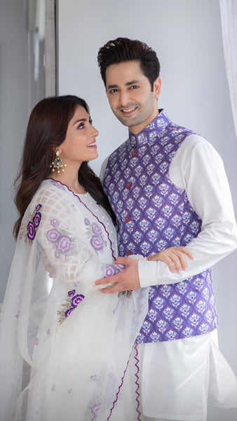 violet Nehru jacket with prints and white kurta and churidar