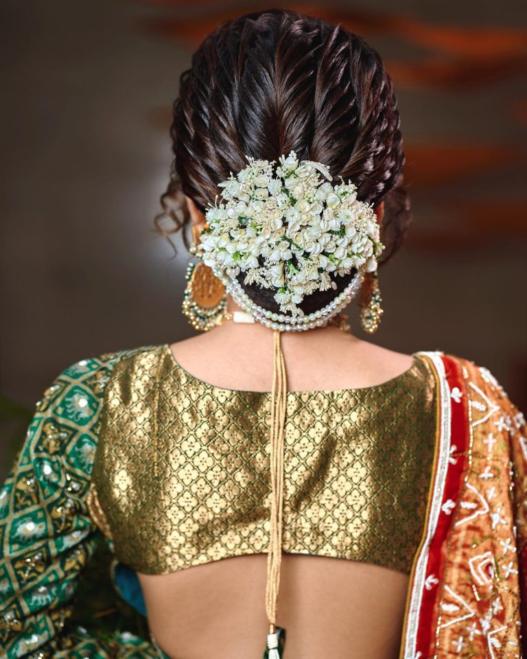 white floral bun - bridal hairstyles