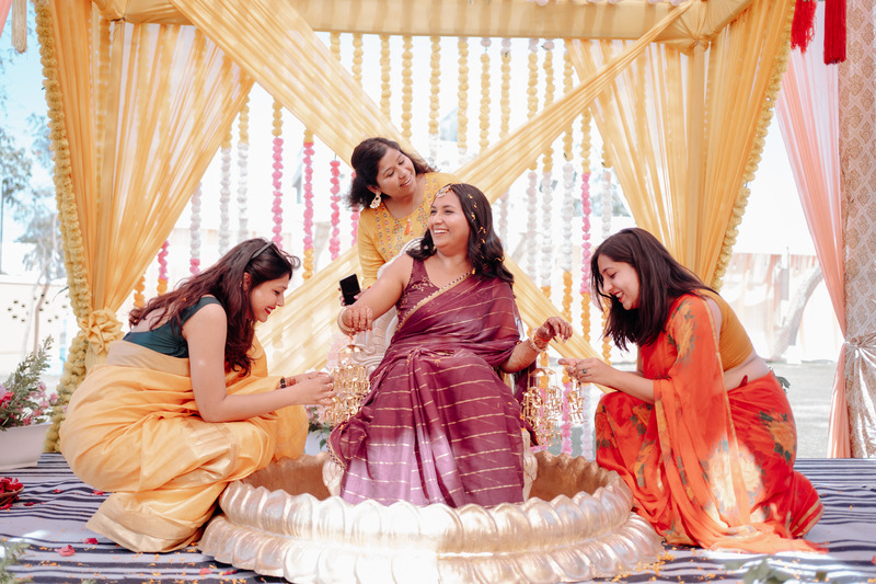 with bridesmaids - haldi poses for bride