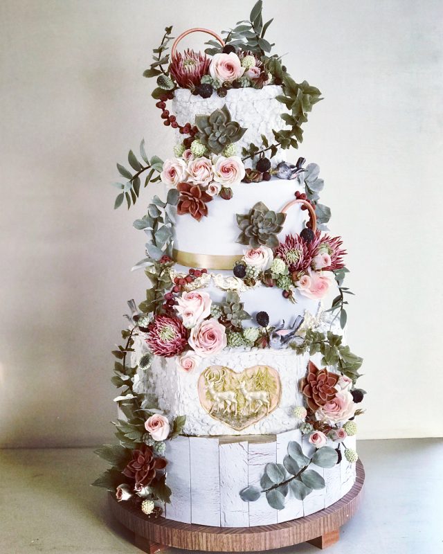 woodland themed 5 tier cake for engagement ceremony